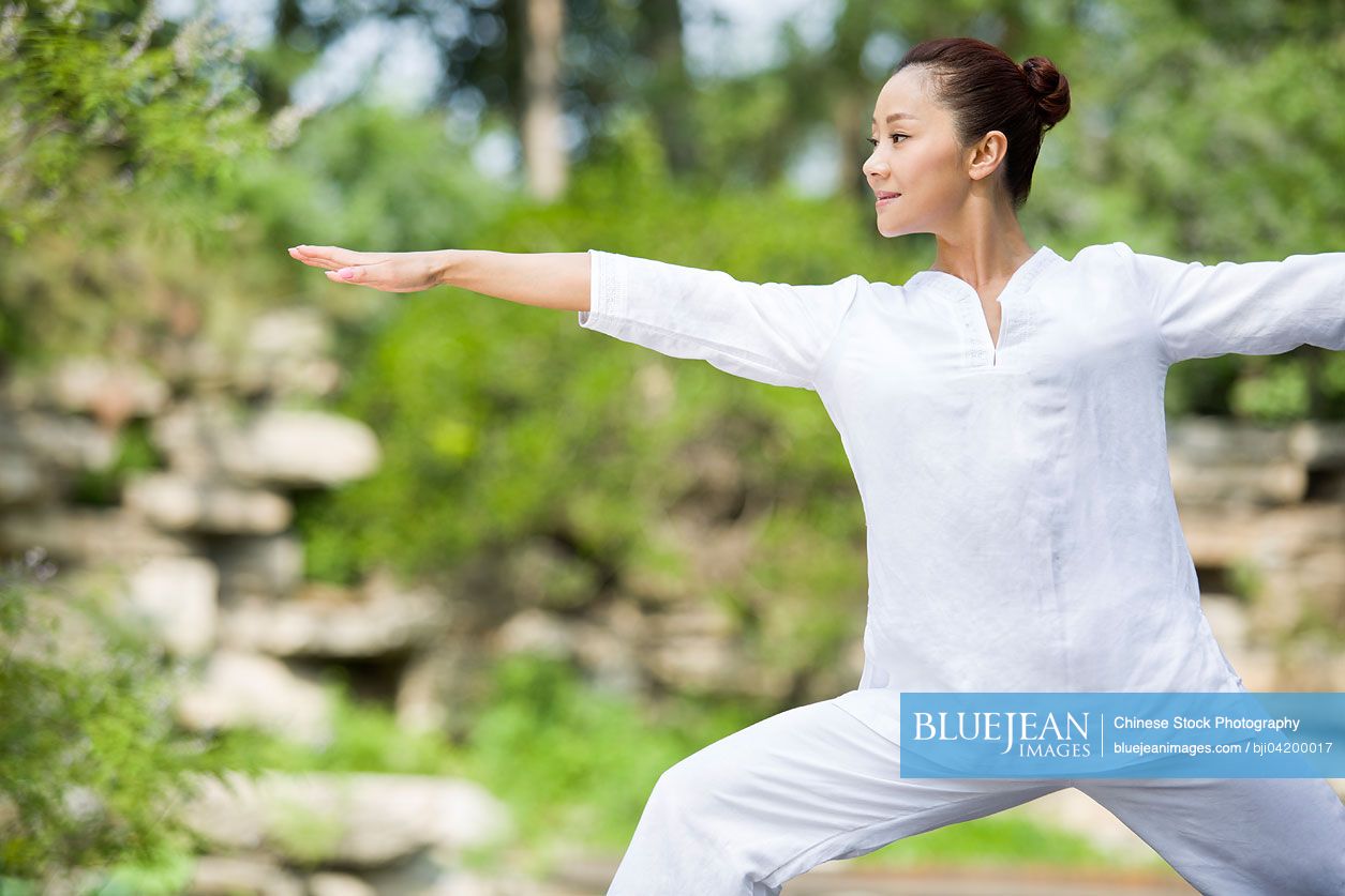 Young Chinese woman practicing yoga