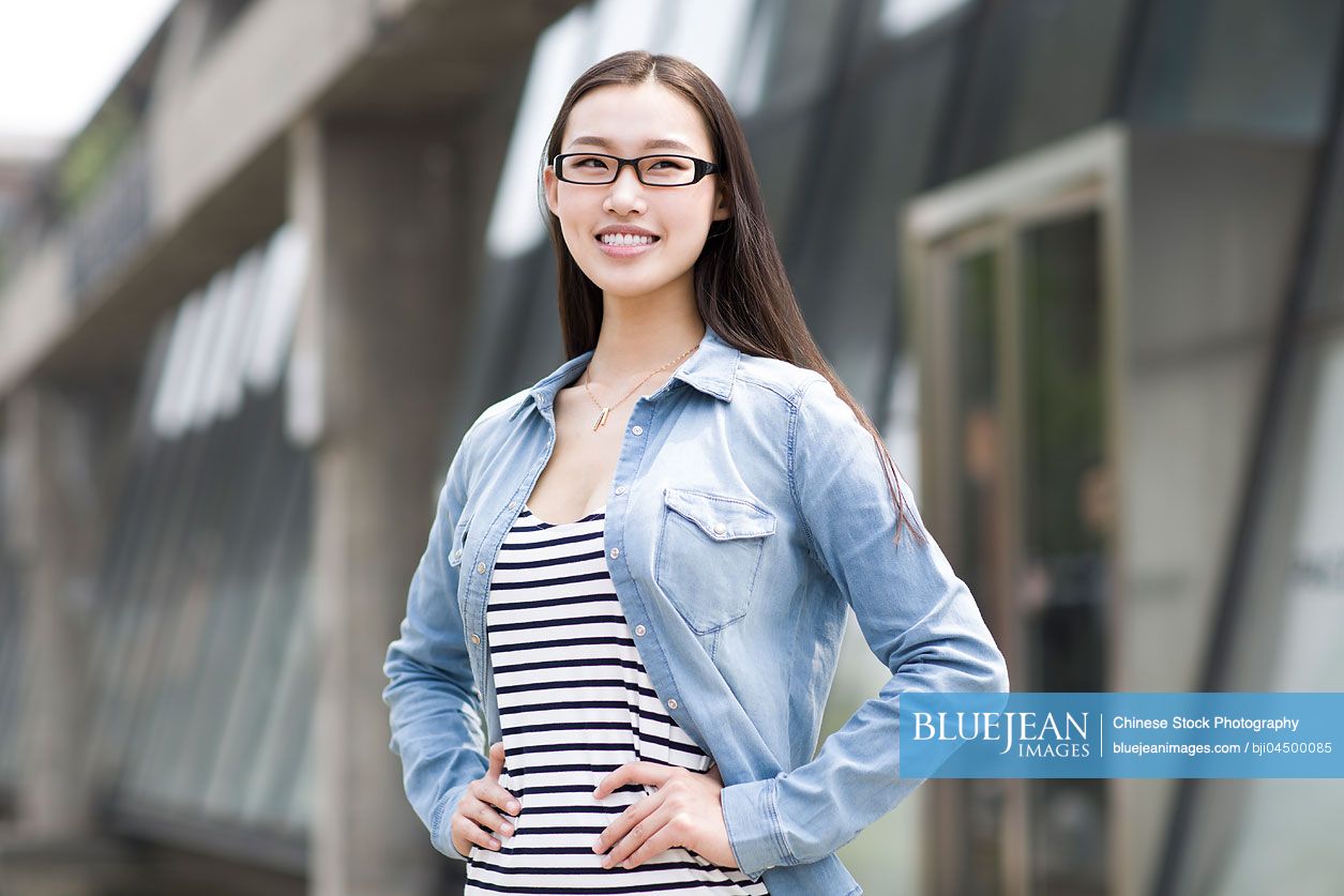 Young Chinese woman thinking