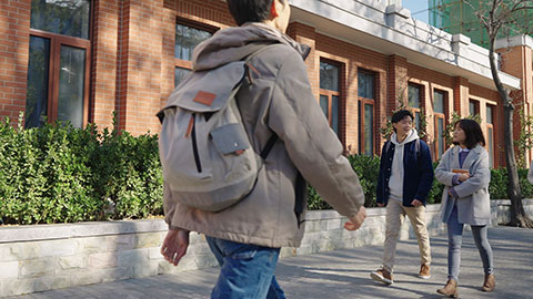 Happy Chinese college students at campus