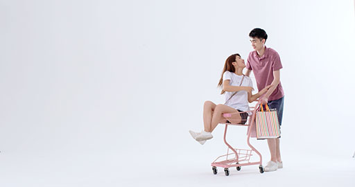 Cheerful young Chinese couple shopping,4K