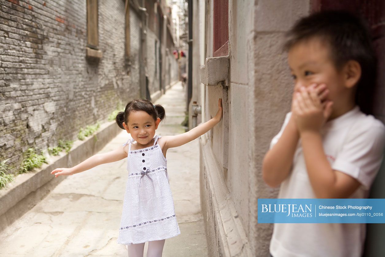 Chinese children playing hide and seek