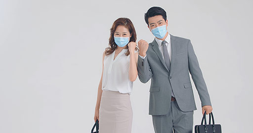 Young Chinese business people with surgical mask punching the air,4K