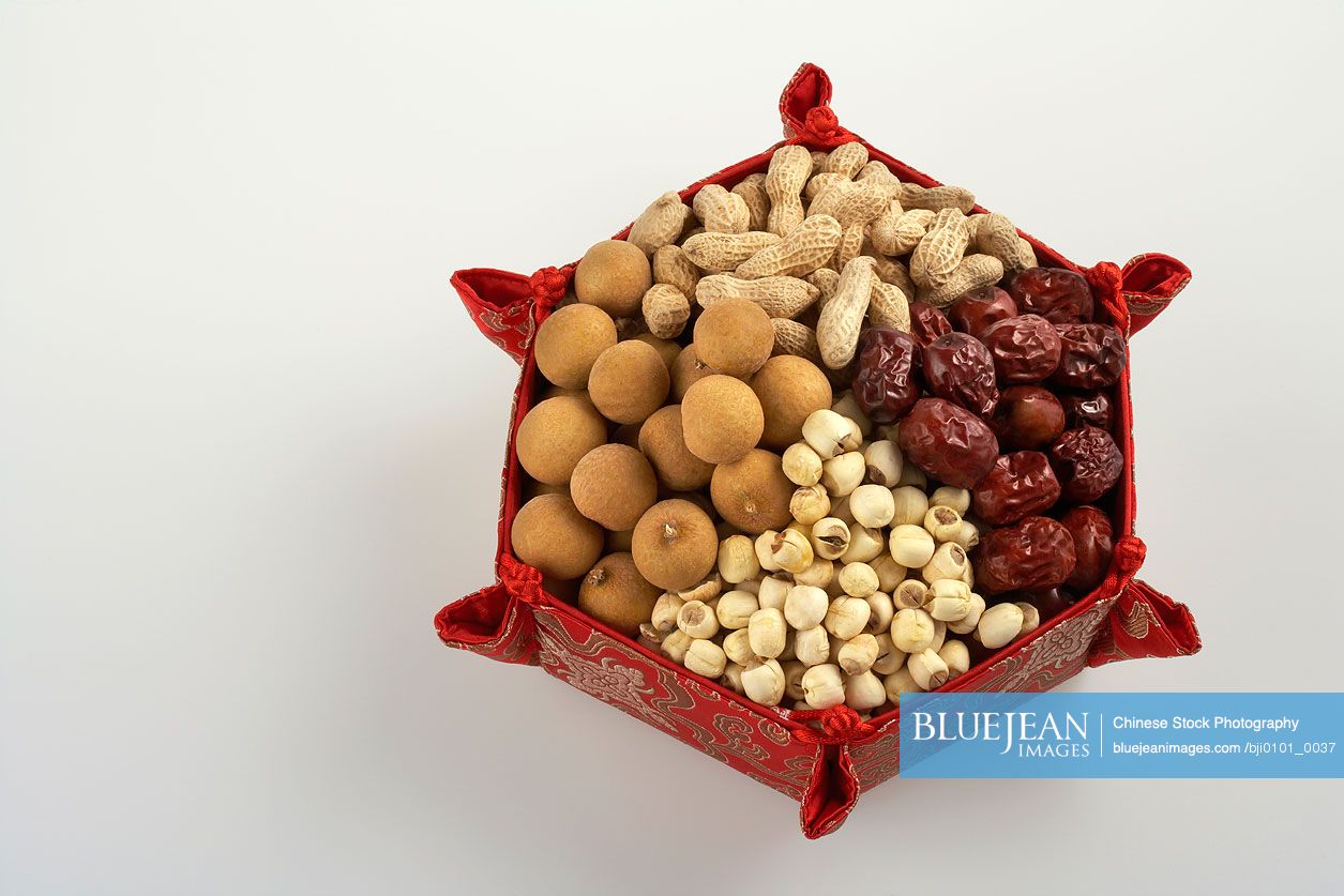 Dried fruits, nuts and legumes in a red star-shaped dish