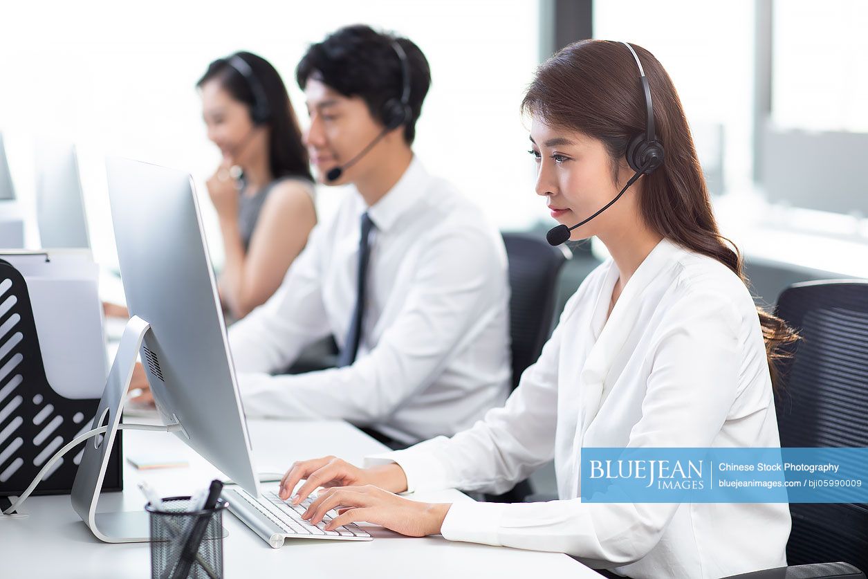 Professional Chinese customer service staff in office