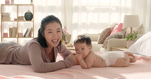 Young Chinese mom taking care of baby girl,4K