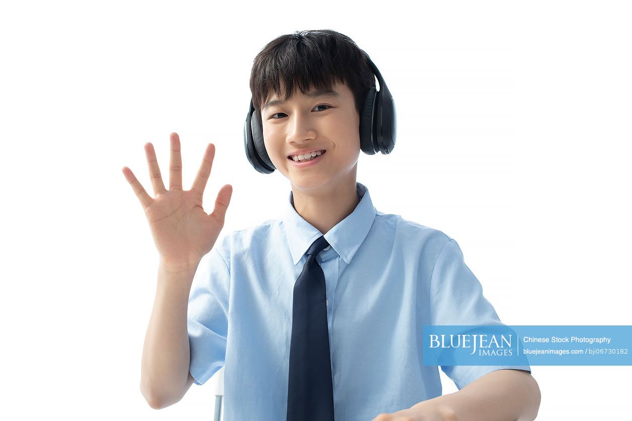 Chinese boy taking an E-learning course