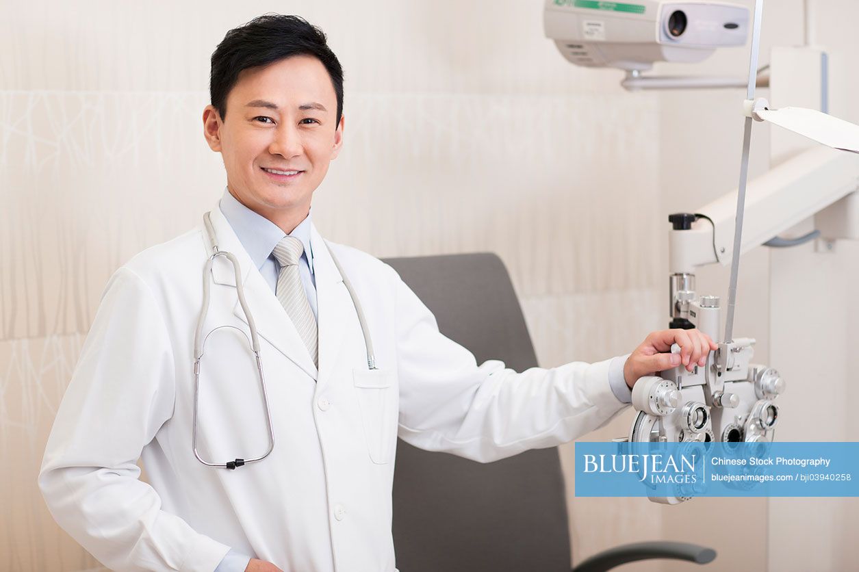 Chinese doctor and medical equipment for eyes checking