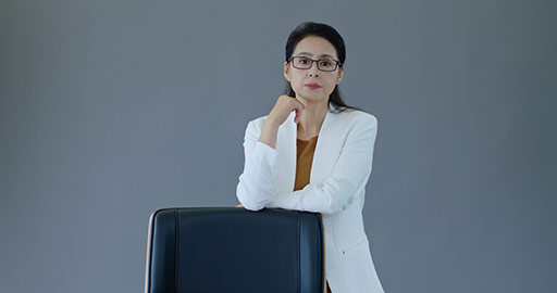 Successful Chinese businesswoman thinking,4K