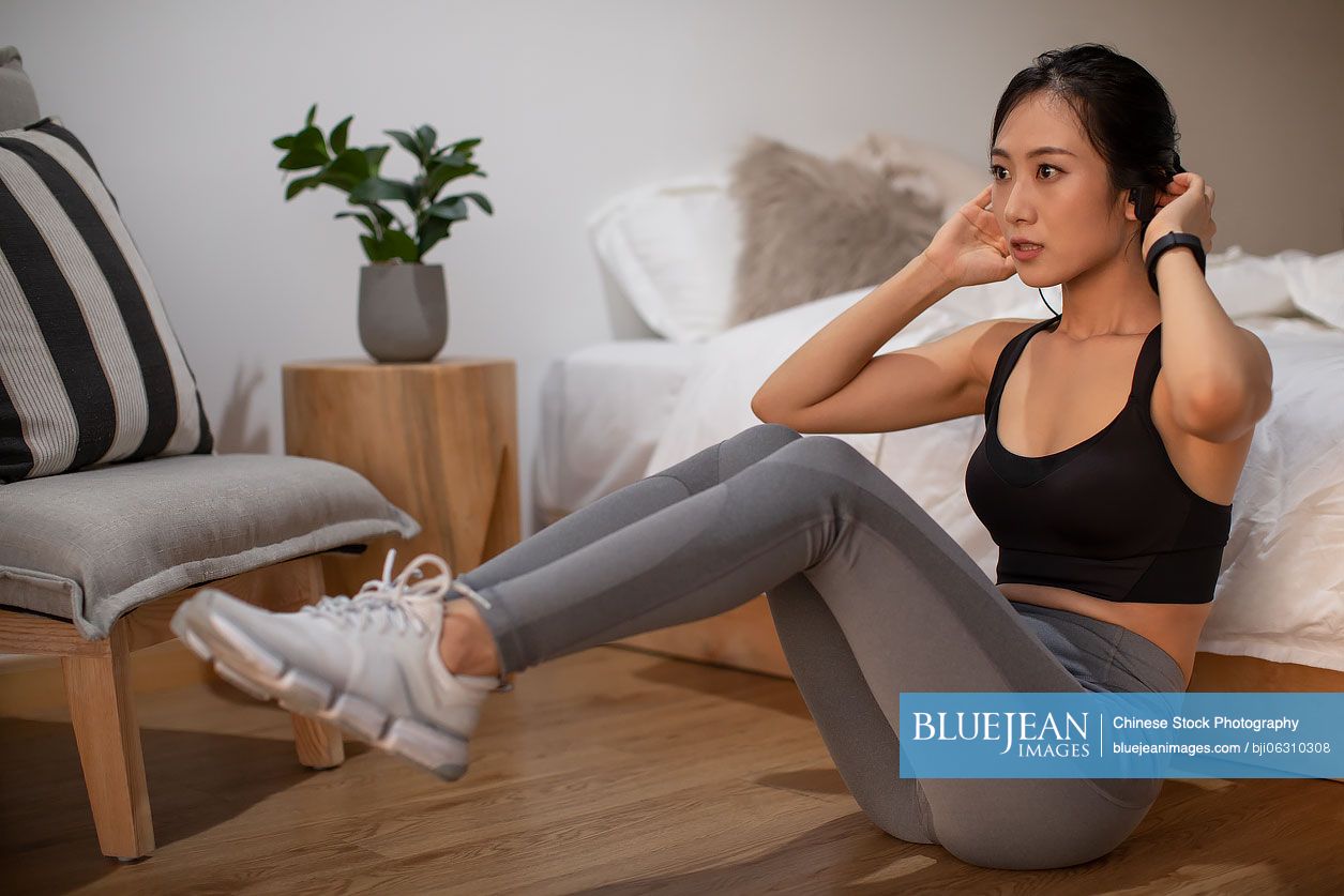 Young Chinese woman exercising in the morning