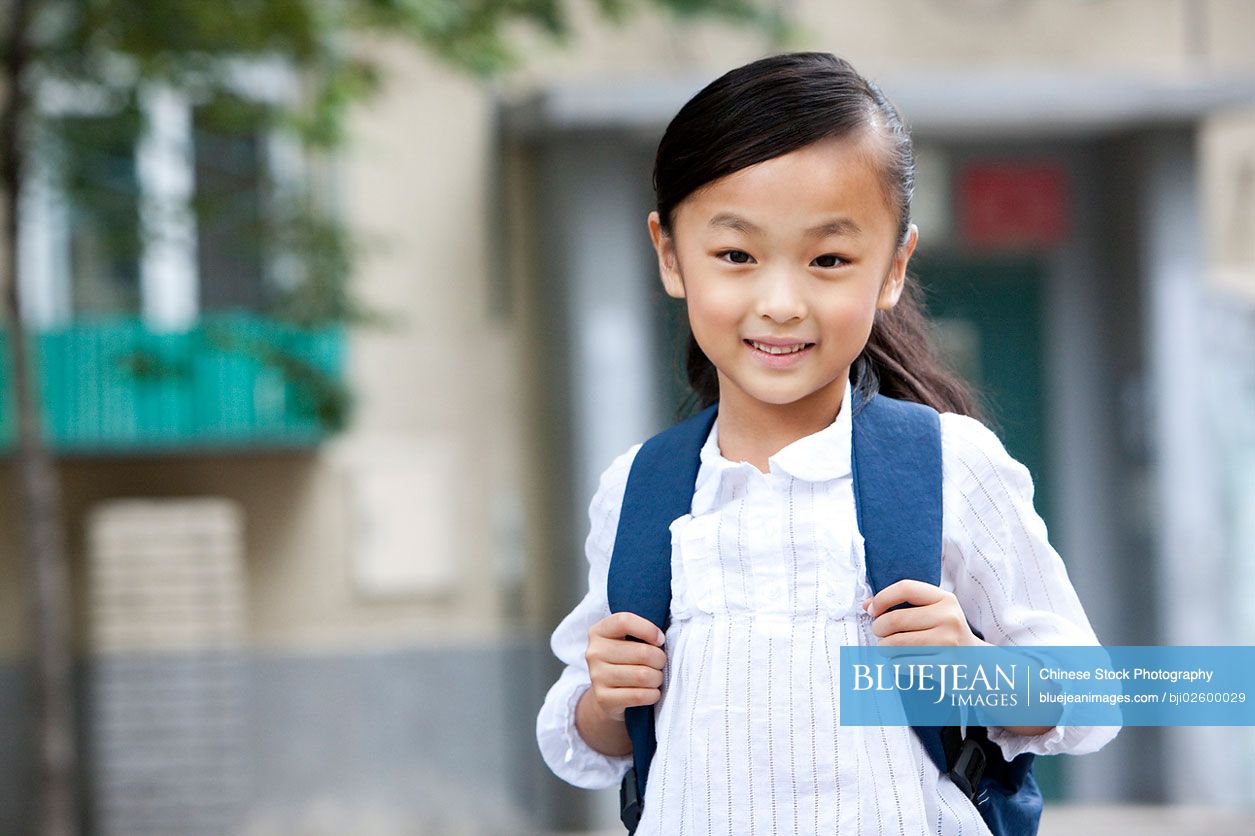 Little Chinese girl going to school