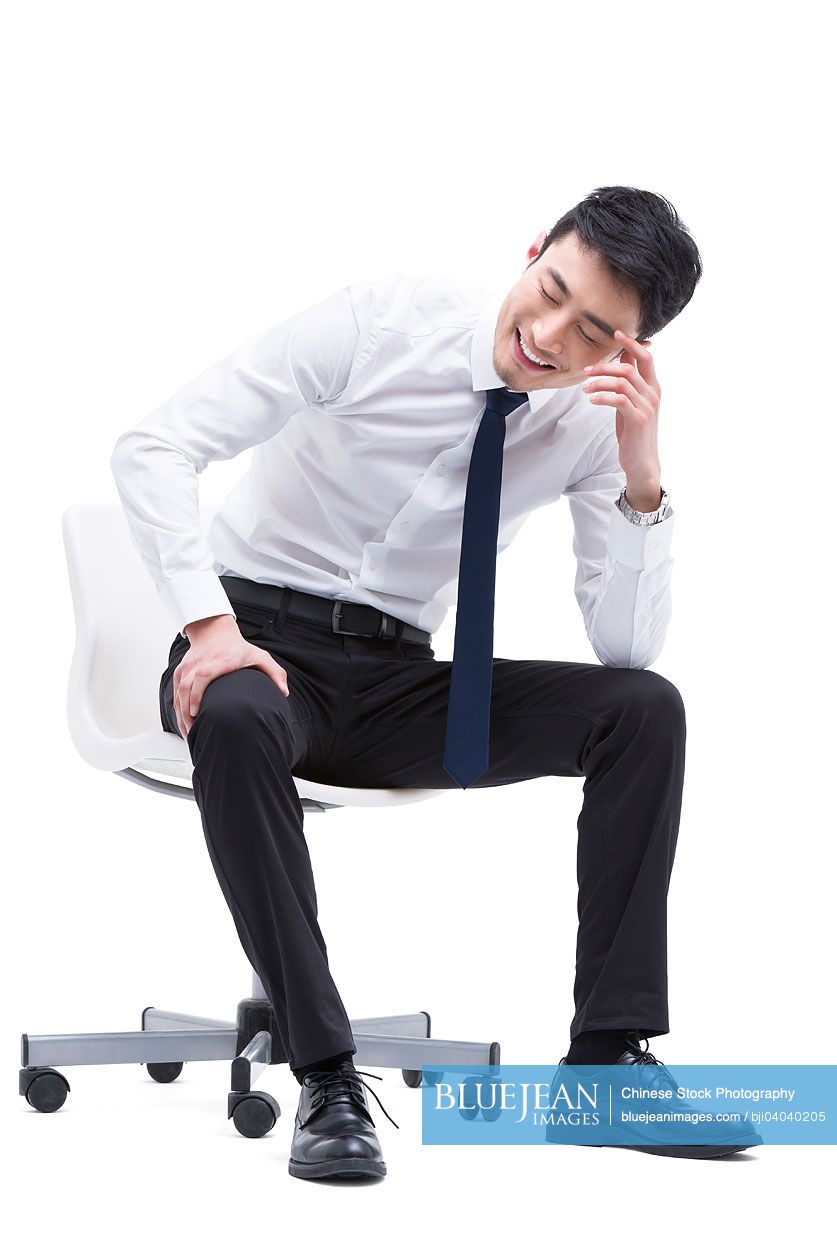 Happy young Chinese businessman