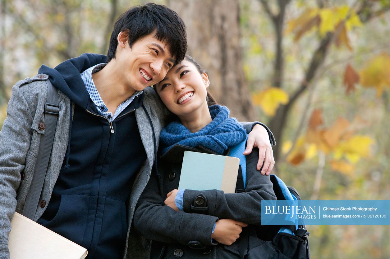 Chinese college couple enjoying a romantic moment together