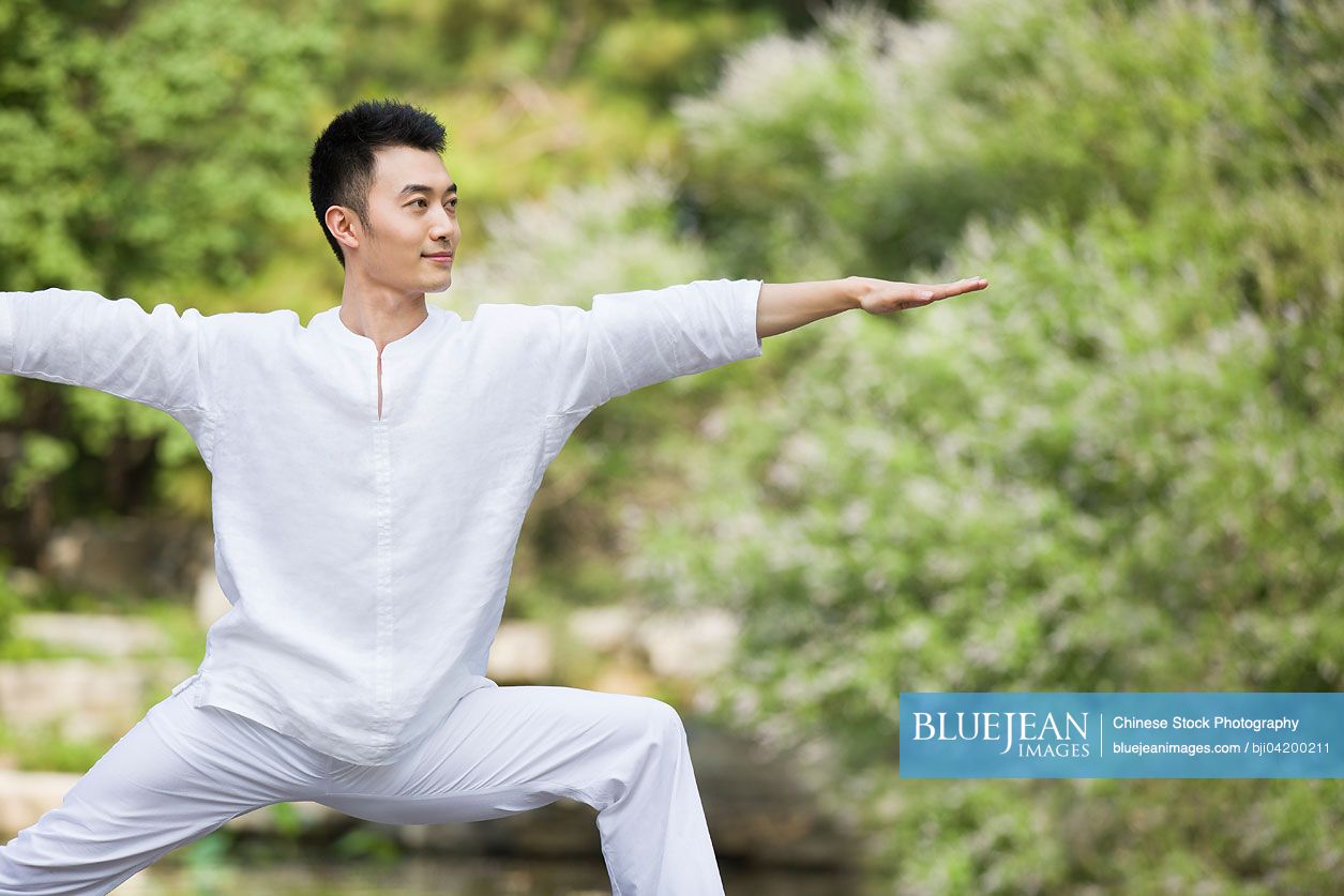 Young Chinese man practicing yoga