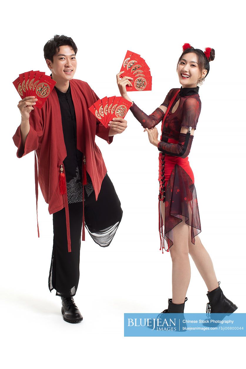 Happy young couple celebrating Chinese New Year