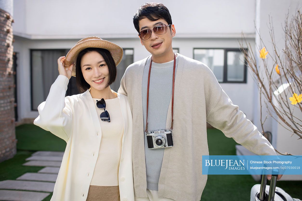 Happy young Chinese couple on vacation-High-res stock photo for download