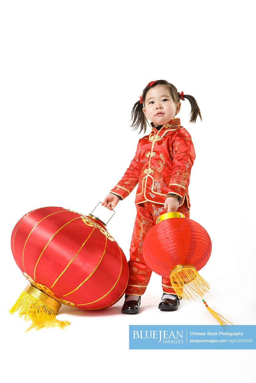 Young girl with Chinese traditional red lantern