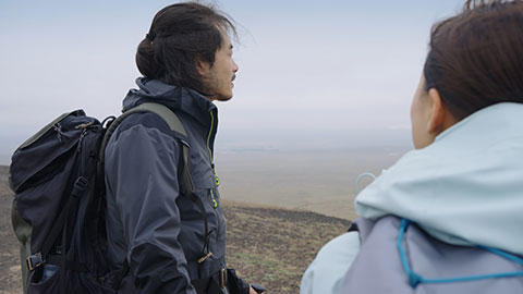 Happy Chinese couple hiking outdoors,4K