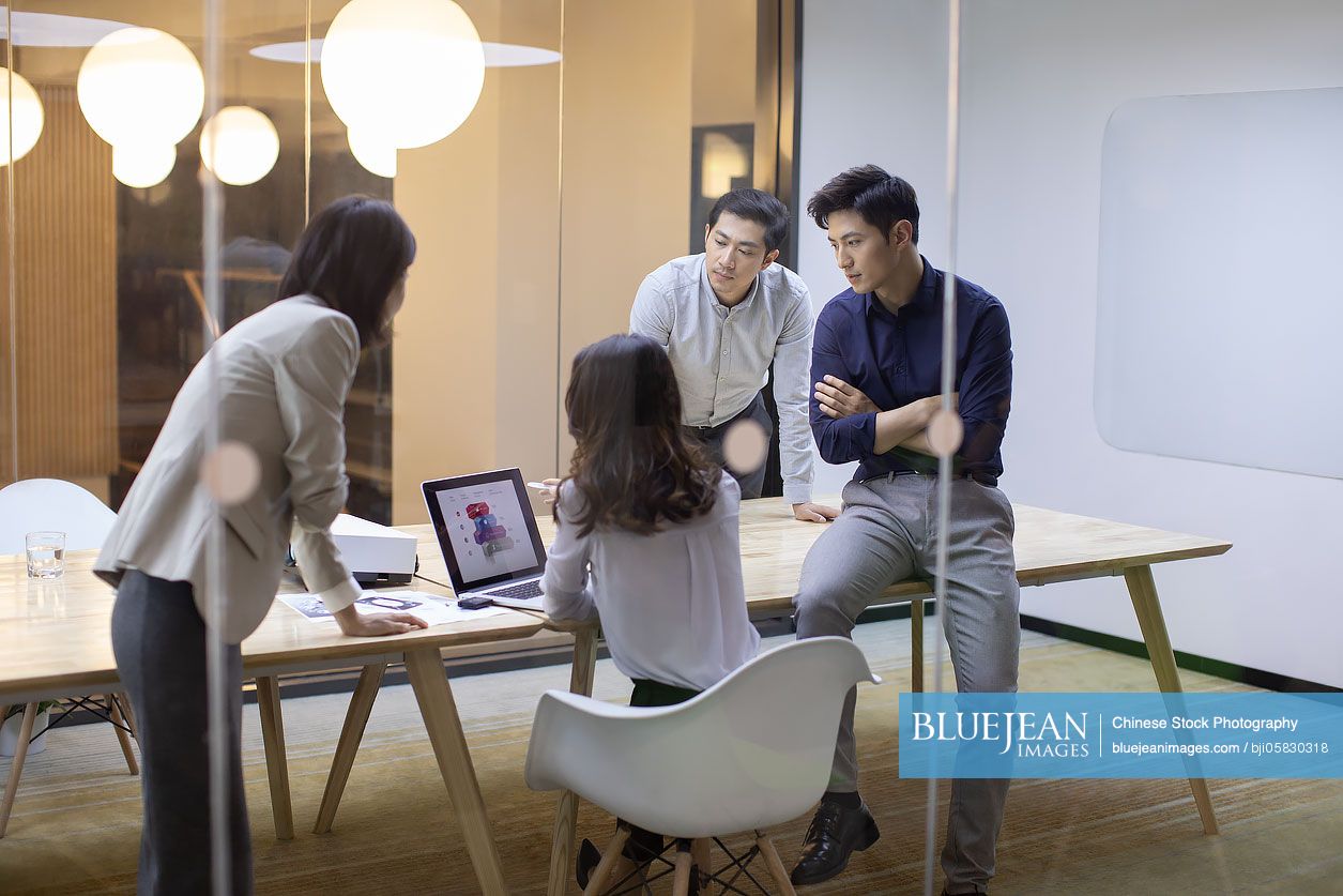 Business people talking in board room 