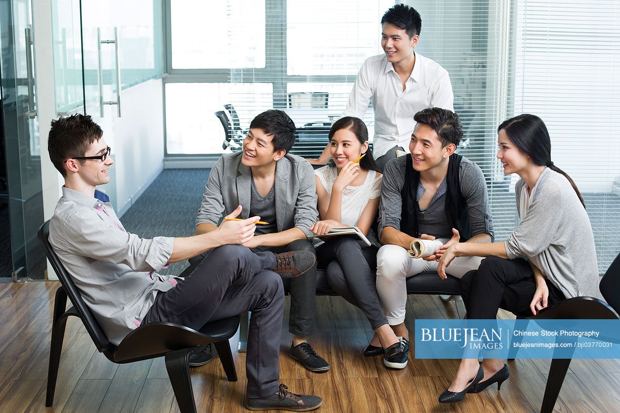 Young office workers holding a meeting-High-res stock photo for download