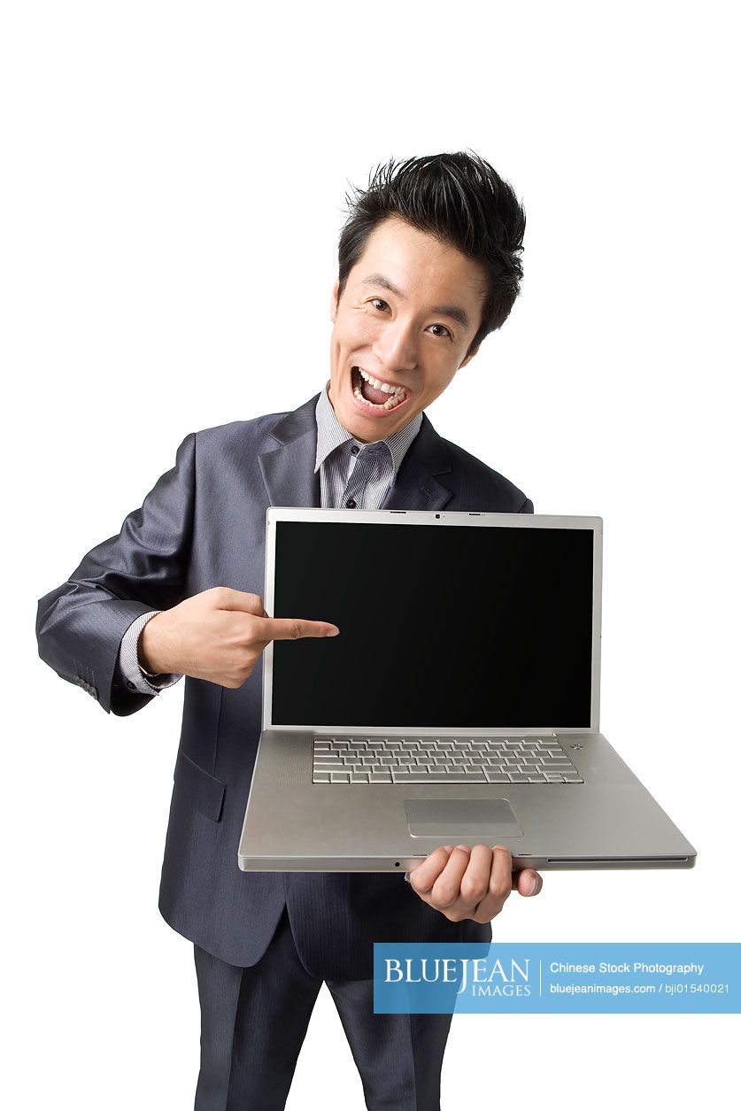 Chinese businessman showing computer