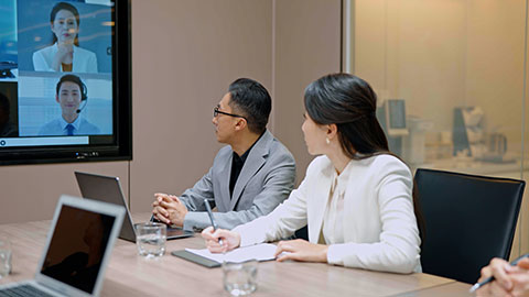 Confident Chinese business people having a meeting