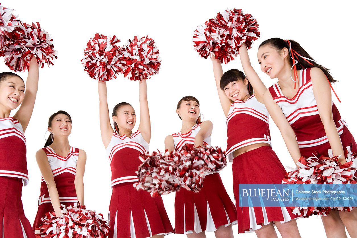 Chinese cheerleaders practicing a cheerHighres stock photo for download