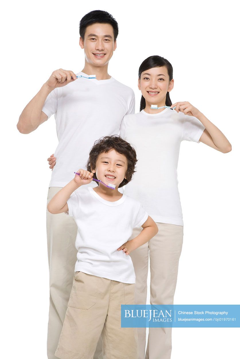 Chinese family brushing teeth