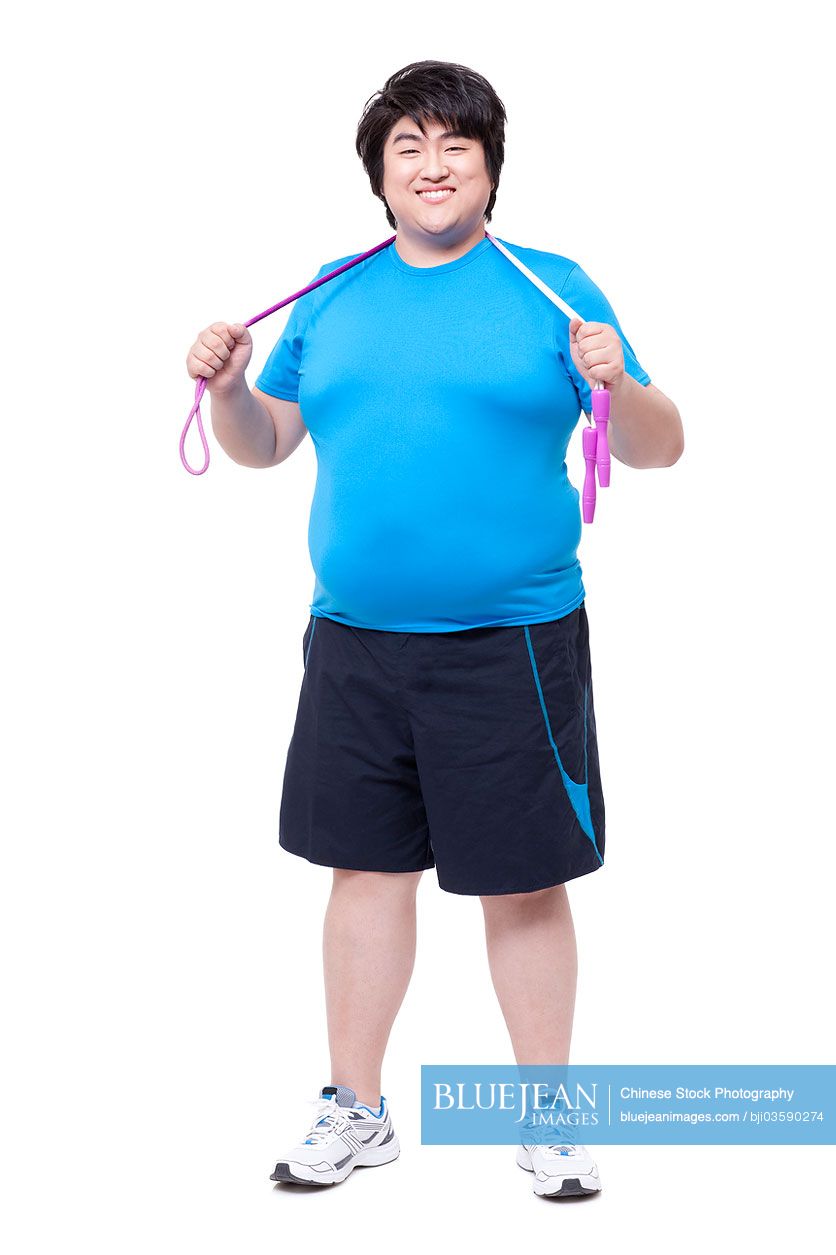 Overweight man with jumping rope