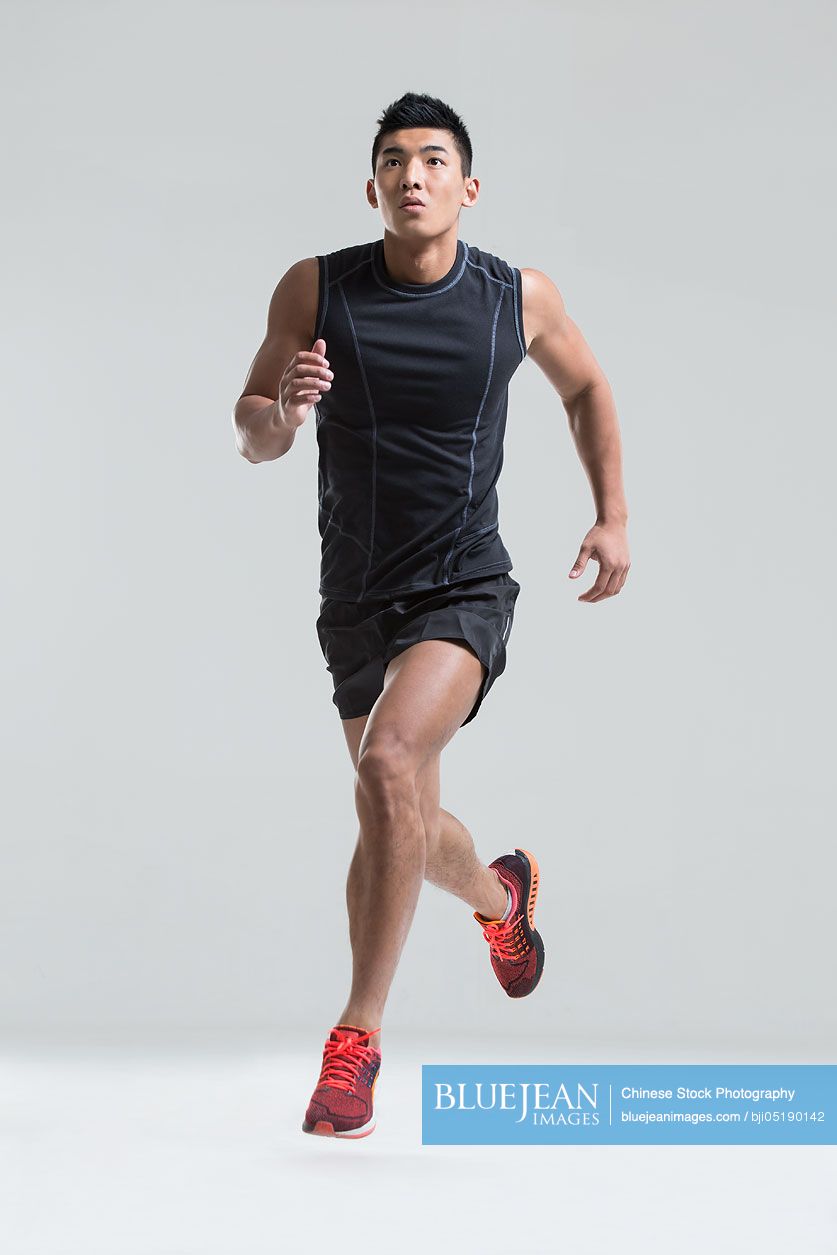 Male Chinese athlete running