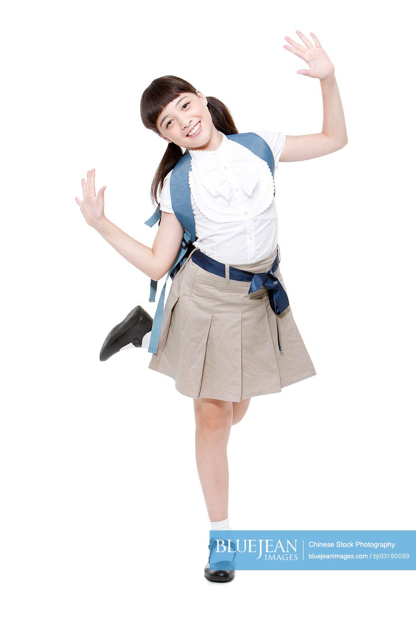 Portrait of cute and lovely Chinese schoolgirl
