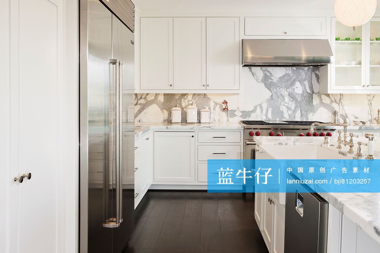 Refrigerator in modern white kitchen; California; United States of America