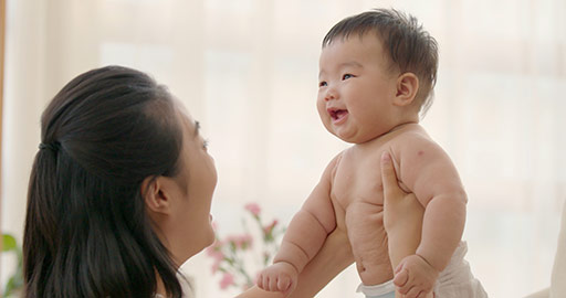 Young Chinese mom having fun with baby girl,4K