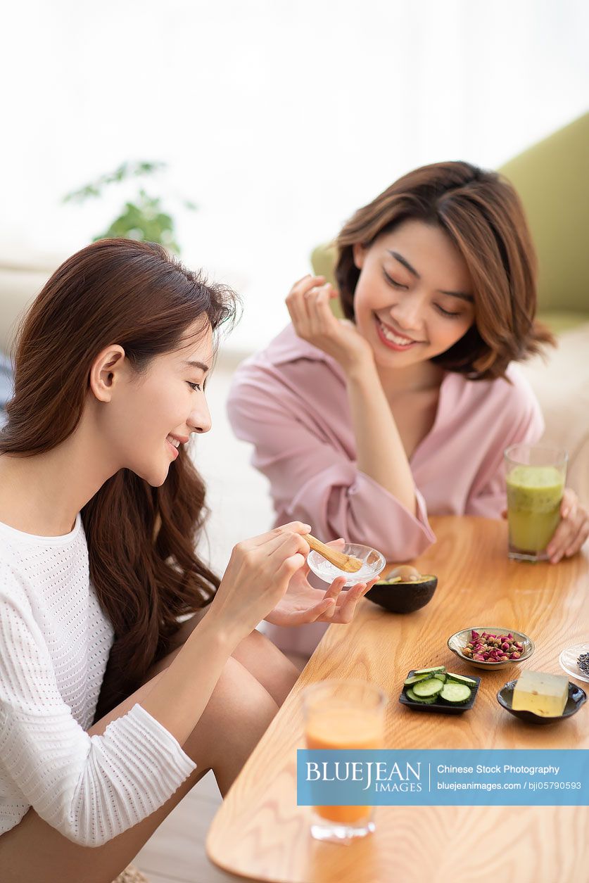Young Chinese friends and skin care