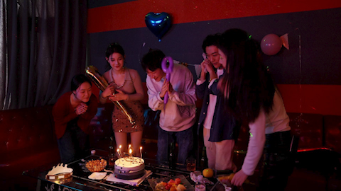 Young friends enjoying a fun karaoke night