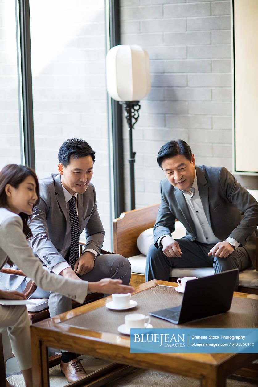 Chinese business people having a meeting