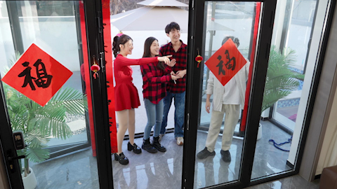 Young friends celebrating Chinese New Year together