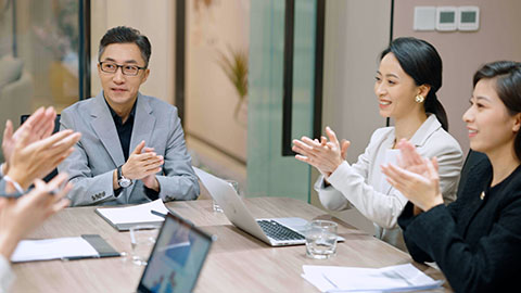 Confident Chinese business people having a meeting