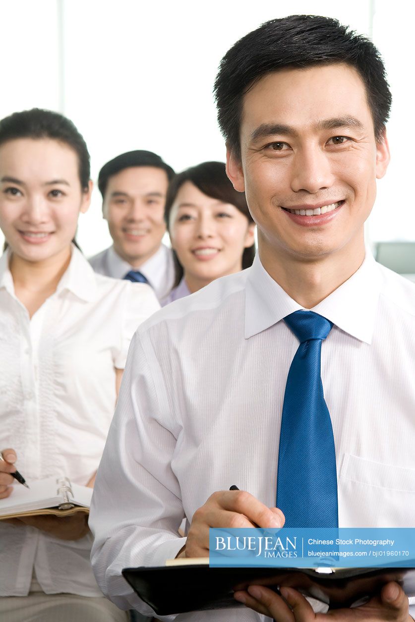 Chinese people meeting at the office