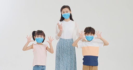 Chinese Children using hand sanitizer with mother's help,4K