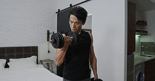 Young Chinese man exercising at home,4K