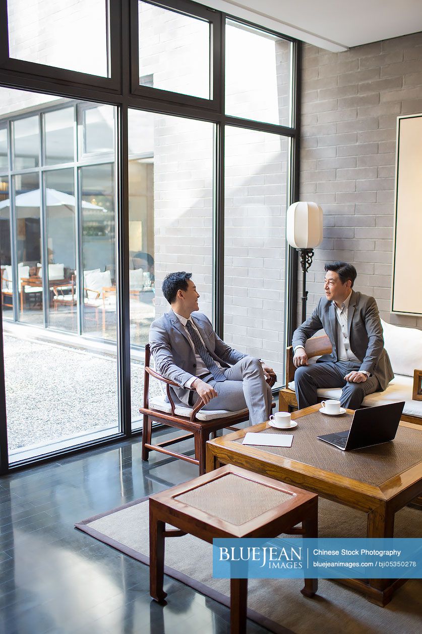 Chinese businessmen having a meeting