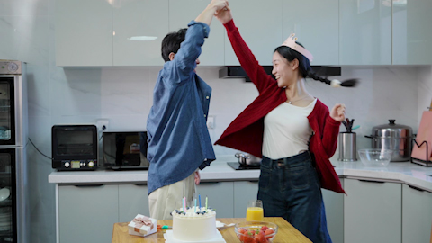 Young couple enjoying a special birthday celebration