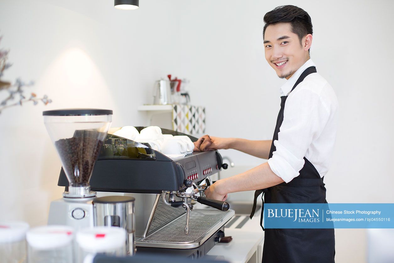 Chinese barista making coffee