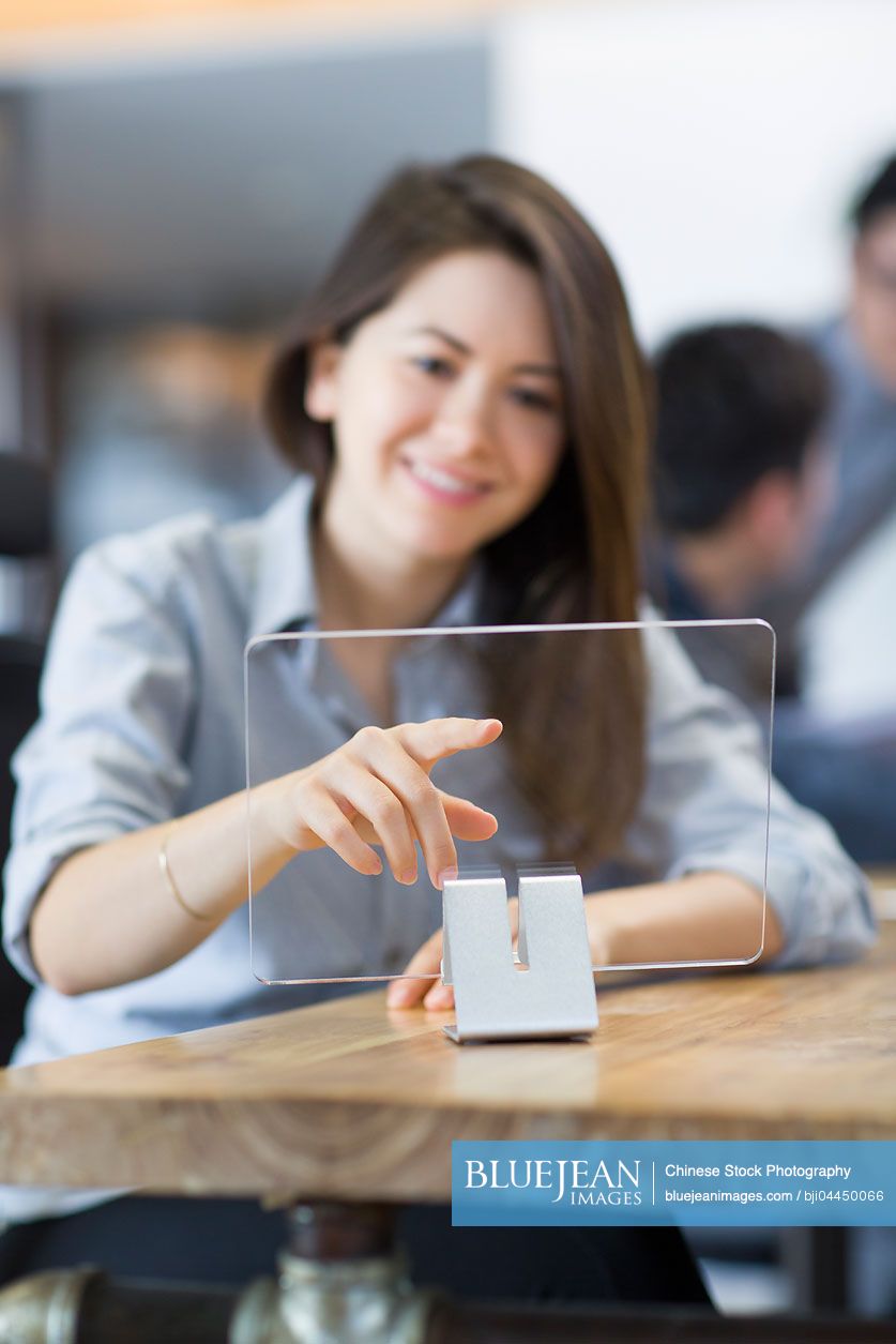 Chinese IT workers developing digital tablet