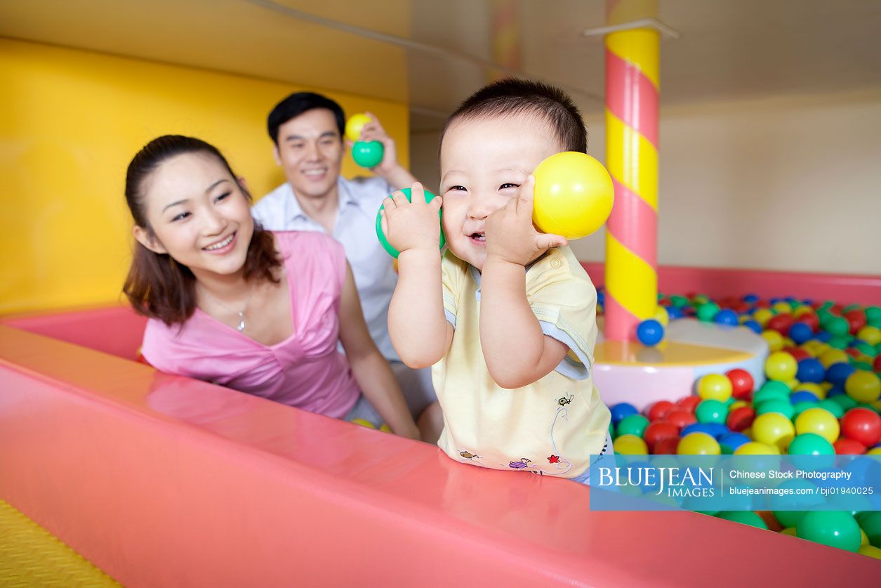 Chinese family playing together