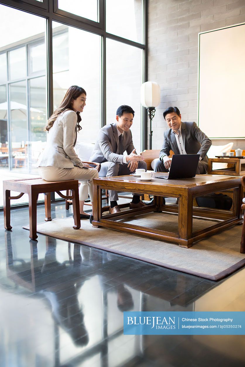 Chinese business people having a meeting