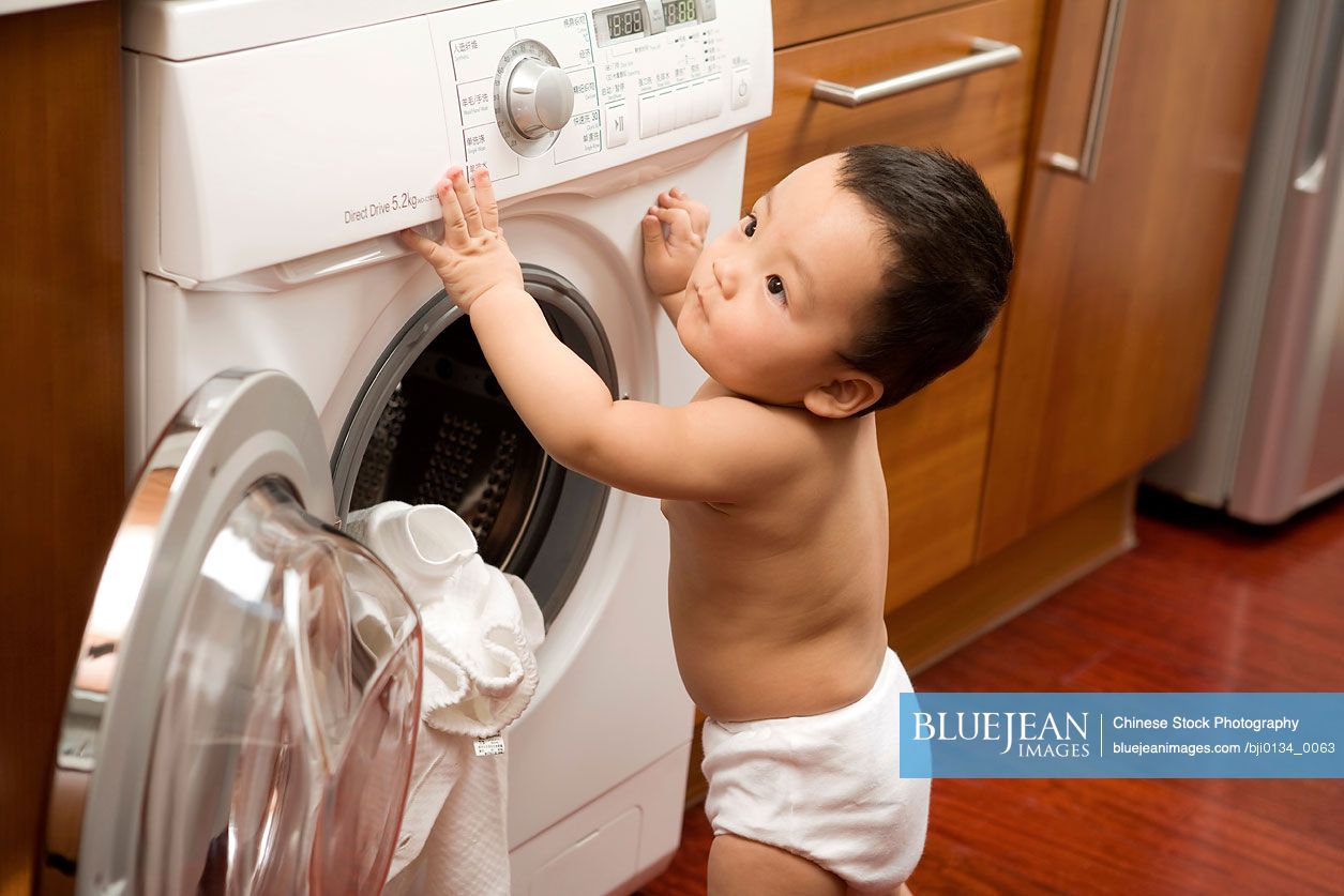 Chinese infant with washing machine