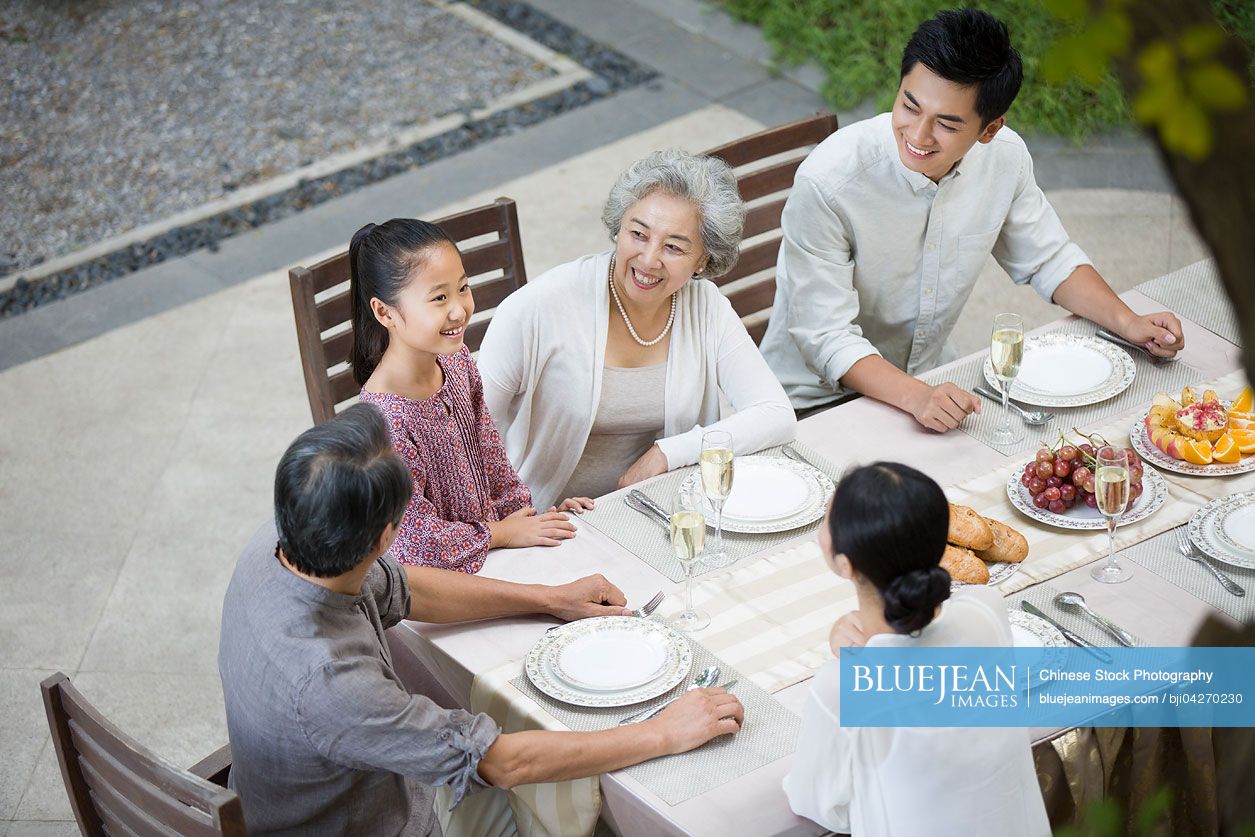 Chinese family eating holiday meal together