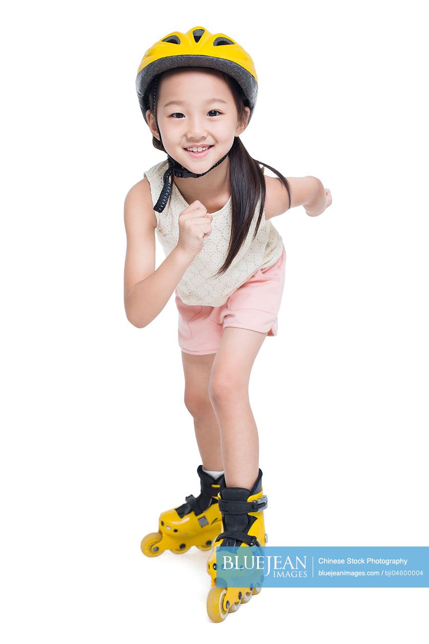 Little Chinese girl roller skating