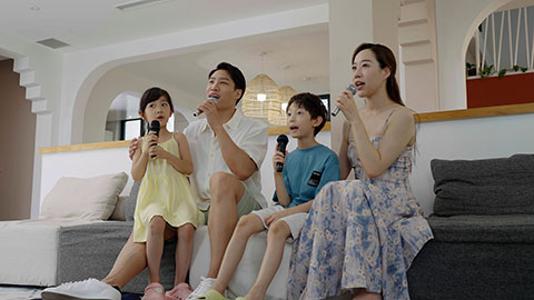 The family is enjoying their vacation and having fun at the hotel
